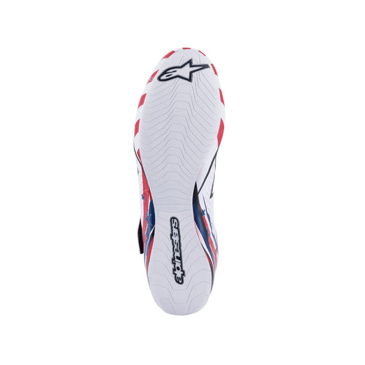 White Alpinestars Supermono v2 Grand Prix Racing sports shoe with red and blue accents on a white background