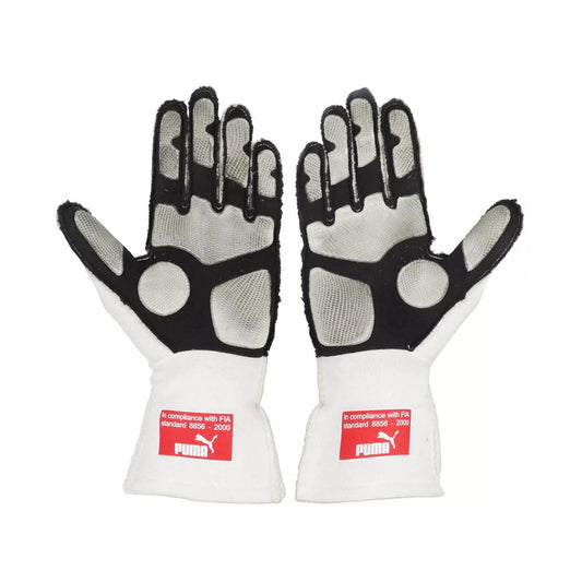Pair of white and black Fernando Alonso 2010 Japanese GP F1 race gloves with Puma branding on a white background