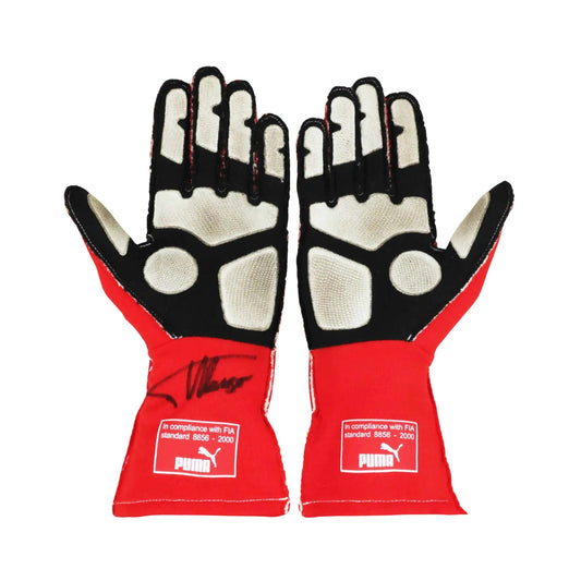 Pair of red and black Fernando Alonso 2014 F1 Race gloves with Puma branding on a white background