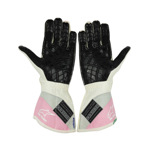 Pair of black and white Lance Stroll 2019 F1 Race gloves with pink accents on a white background