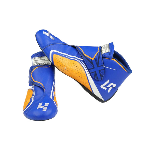 Blue and orange Lando Norris 2021 F1 Racing boots with visible branding on a white background