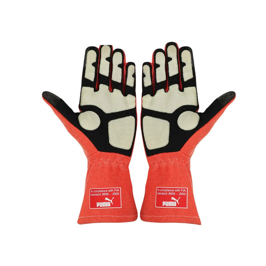 Pair of red Michael Schumacher 2012 F1 Race gloves with black and white accents on a white background
