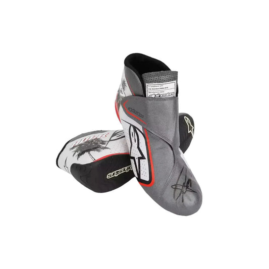 Pair of gray and black protective Nico Hülkenberg 2023 Miami GP Weekend Worn F1 Racing boots on a white background