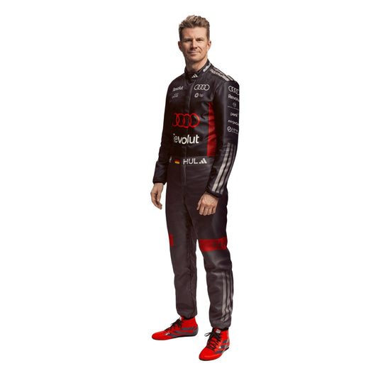 Nico Hulkenberg wearing a Audi racing suit with various sponsor logos with Left View