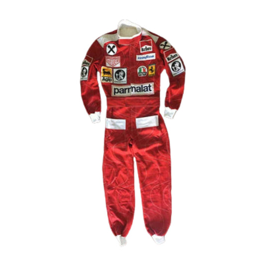 Front view of Niki Lauda’s 1976 F1 racing suit, featuring Ferrari's classic red color with sponsor logos, worn during his legendary comeback after a life-threatening crash.