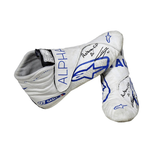 White and gray Pierre Gasly 2020 Austrian Grand Prix F1 Race shoes with blue and black branding on a white background