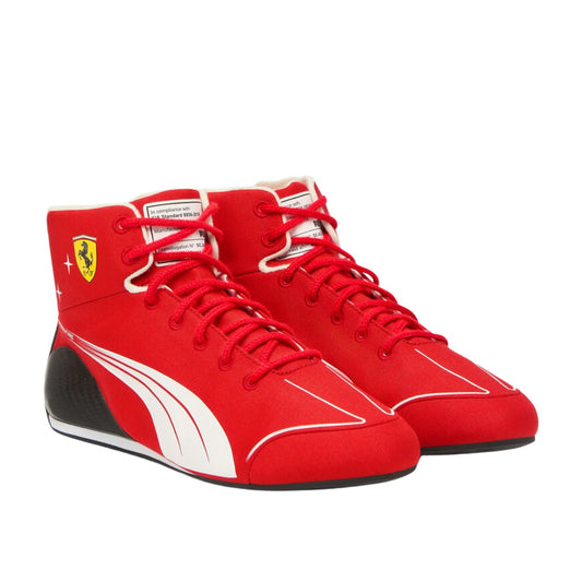 A pair of red Puma Scuderia Ferrari high-top sneakers, featuring the yellow Ferrari shield logo on the side and white Puma Formstrip details, set against a plain white background.