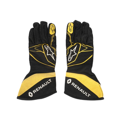 Black and yellow Carlos Sainz 2017 F1 race gloves with Renault branding on a white background