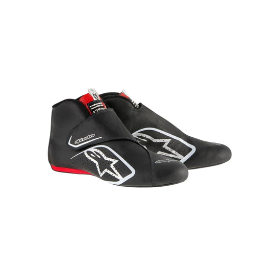 Black Carlos Sainz 2017 F1 race shoes with visible branding on a white background