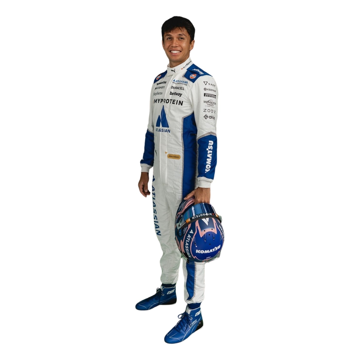 Albon in a 2025 british gp racing suit holding a helmet on a white background