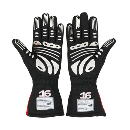 Pair of black Charles Leclerc 2023 F1 race gloves with white accents and '16' branding on a white background