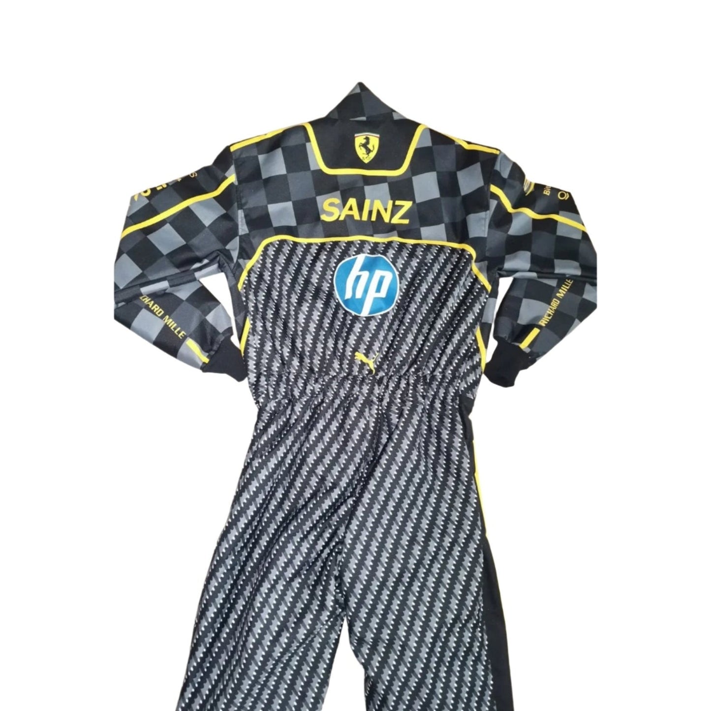 Rear view of the 2024 Italian GP race suit worn by Carlos Sainz Jr., featuring a black carbon fiber pattern with yellow detailing on the shoulders.