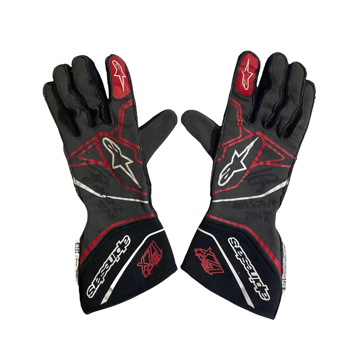 Black and red Conor Daly 2018 NASCAR race gloves with visible branding on a white background