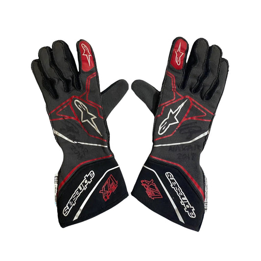 Black and red Conor Daly 2018 NASCAR race gloves with visible branding on a white background
