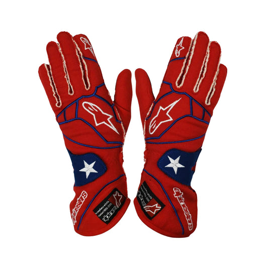 Red Danica Patrick 2008 Indy Car race gloves with a star and stripe design on a white background