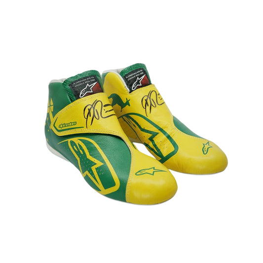 Yellow and green Daniel Ricciardo 2019 Australian Grand Prix F1 race shoes with branding on a white background