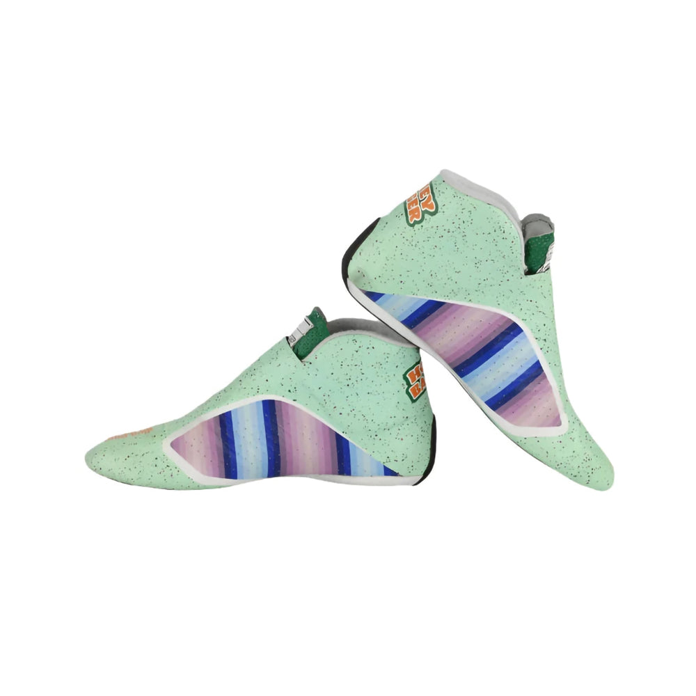 Pair of green Daniel Ricciardo 2021 Honey Badger F1 Racing shoes with colorful sole on a white background