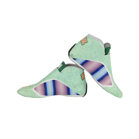 Pair of green Daniel Ricciardo 2021 Honey Badger F1 Race shoes with colorful sole on a white background