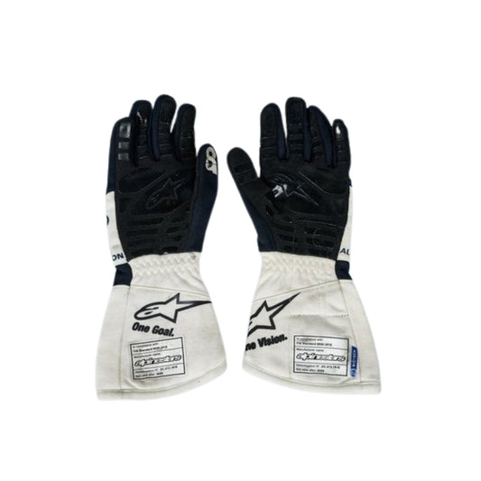 Pair of black and white Daniel Ricciardo 2023 F1 Race gloves with visible branding on a white background