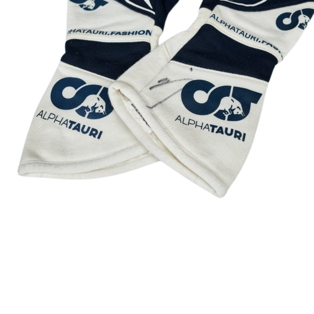 White Daniel Ricciardo 2023 F1 Race gloves with AlphaTauri logo on a white background