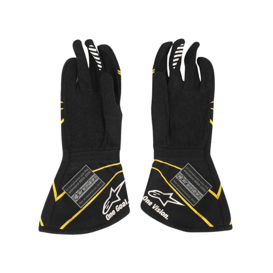 Black Esteban Ocon 2016 F1 race gloves with yellow accents and brand logos on a white background