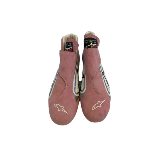 Pair of red Esteban Ocon 2018 F1 Race shoes with a logo on a white background