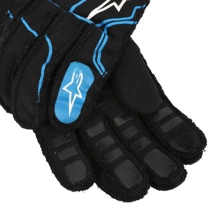 Black Esteban Ocon 2021 F1 race glove with blue accents and a logo on a white background