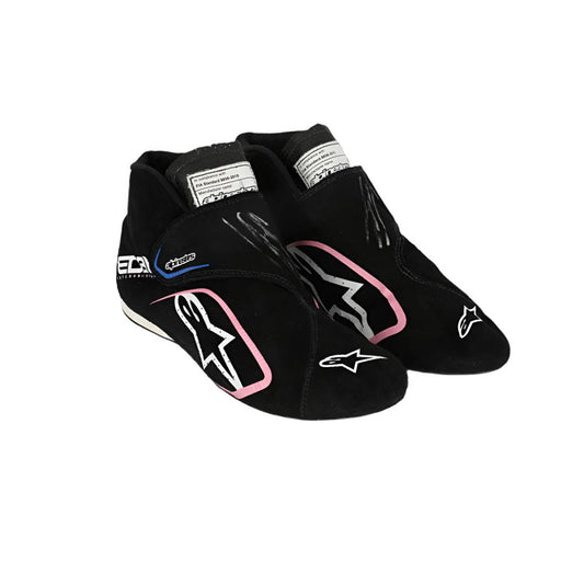 Black  Esteban Ocon 2023 Miami GP F1 race shoes with pink accents on a white background
