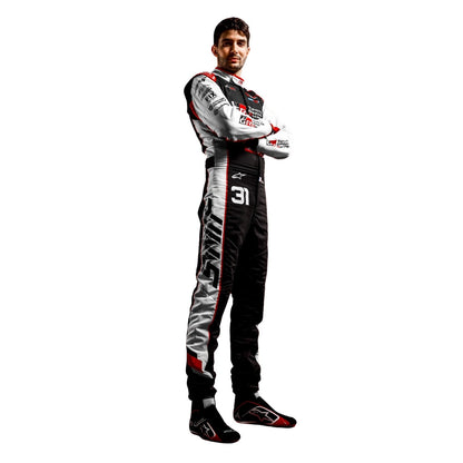 Esteban Ocon wearing a Haas racing suit with various sponsor logos with Right View