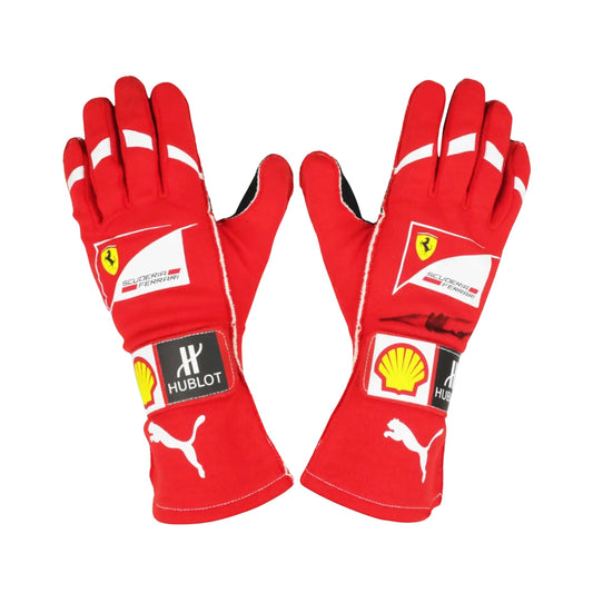 Red Fernando Alonso 2014 F1 race gloves with various brand logos on a white background