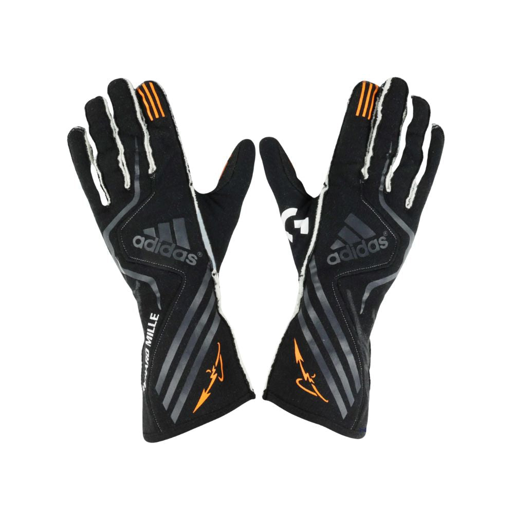 Pair of black Adidas Fernando Alonso 2017 F1 Race gloves with orange accents on a white background