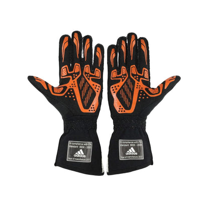 Black and orange Fernando Alonso 2017 F1 Race gloves with Adidas branding on a white background