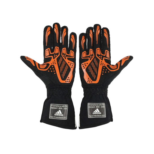 Black and orange Fernando Alonso 2017 F1 Race gloves with Adidas branding on a white background