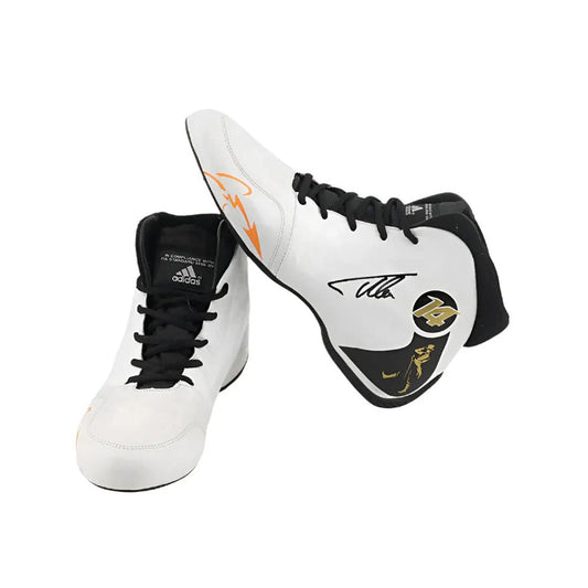 White and black Fernando Alonso 2017 athletic F1 Race Shoes with branding on a white background