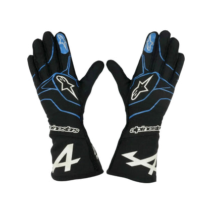 Black Fernando Alonso 2021 F1 race gloves with blue accents and Alpinestars logo on a white background