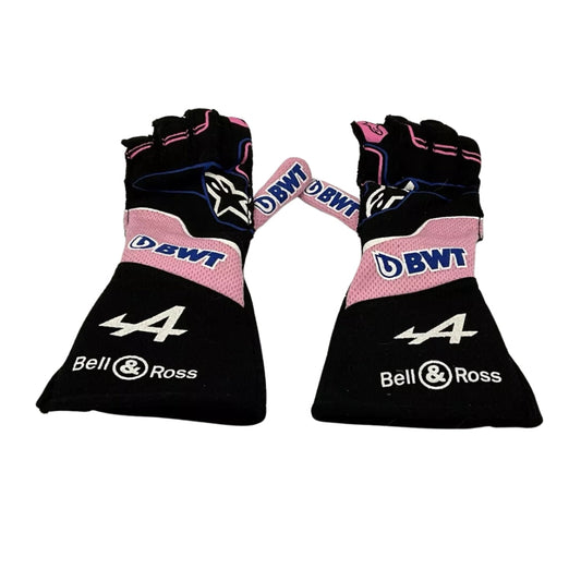 Pair of black and pink Fernando Alonso 2022 F1 Race gloves with branding on a white background