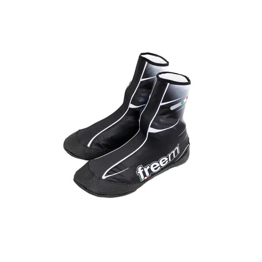 Black and white Freem Yeti shoe covers with 'freem' branding on a white background