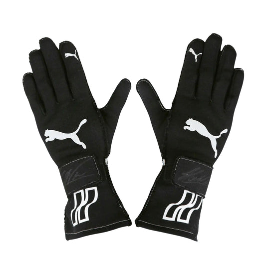 Pair of black Helio Castroneves 2017/18 IndyCar IMSA race gloves with Puma logo on a white background
