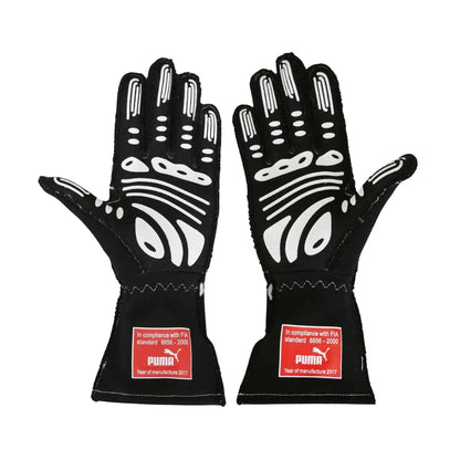 Black Helio Castroneves 2017/18 IndyCar IMSA race gloves with white patterns and Puma labels on a white background