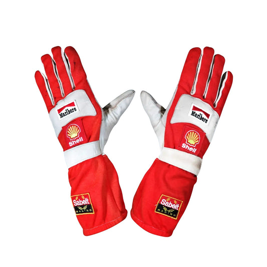 Red and white Helio Castroneves 2017 IndyCar race gloves with Shell and Sabelt logos on a white background