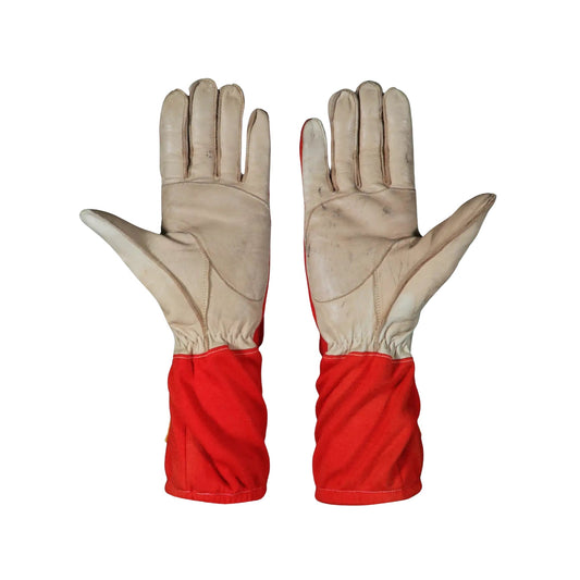 Pair of leather Castroneves 2017 IndyCar race gloves with red cuffs on a white background