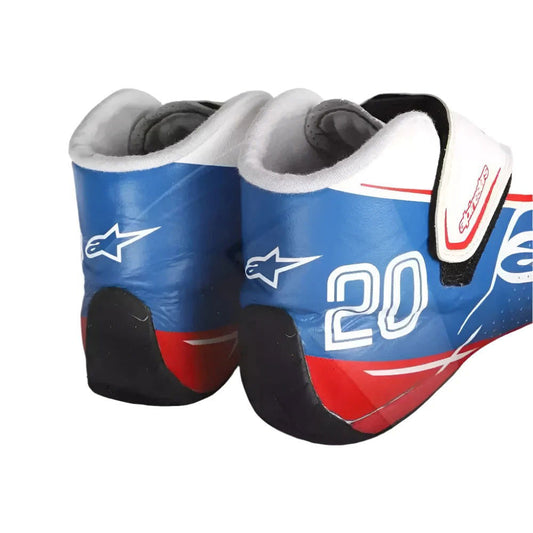 Pair of blue, red, and white Kevin Magnussen 2022 Italian GP Special Edition F1 Racing shoes with number 20 on a white background