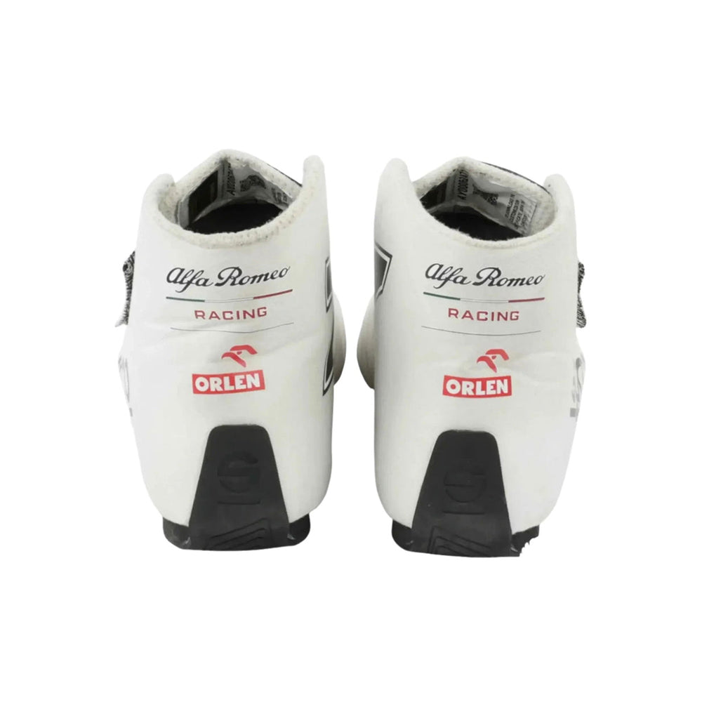 White Kimi Räikkönen 2021 F1 racing boots with Alfa Romeo and Orlen branding on a white background