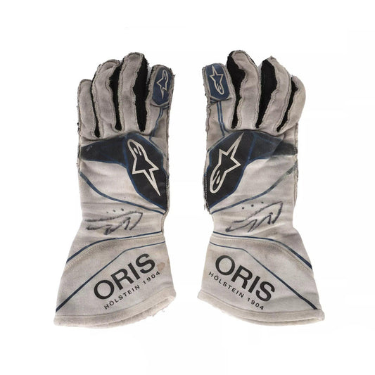 Pair of gray Lance Stroll 2017 F1 Race gloves with 'Oris' branding on a white background
