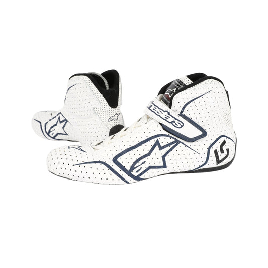 White Lance Stroll 2017 F1 racing boots with black accents on a white background