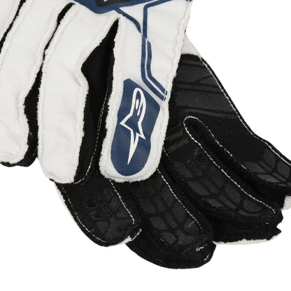 Close-up of a Lance Stroll 2018 white and black F1 race glove with a blue logo on a white background