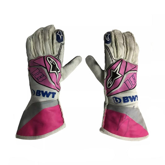 Pair of gray and pink Lance Stroll 2020 F1 race gloves with visible branding on a white background