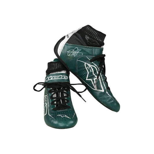 Green Lance Stroll 2021 F1 Racing boots with black soles on a white background