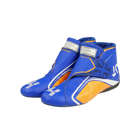 Blue and orange Lando Norris 2021 F1 Race shoes on a white background