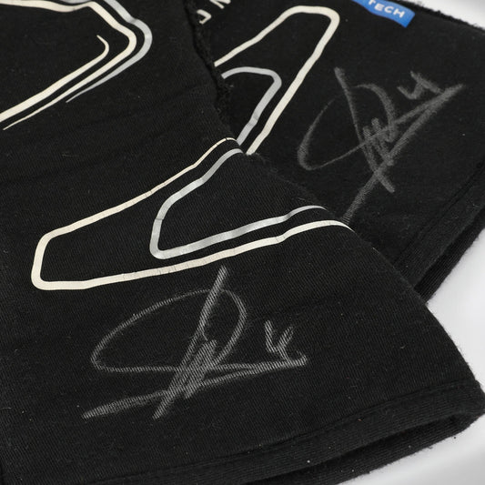 Black Lando Norris 2023 F1 Race gloves with white outlines and signatures on a white background